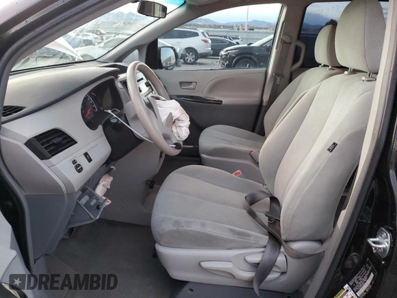 2014 Toyota Sienna L with VIN 5TDZK3DC1ES486586, listed as a Copart auction lot 84680574 with 122,332 mi miles and Salvage Title. Bid and sale history available at carsss.com. Image 7.