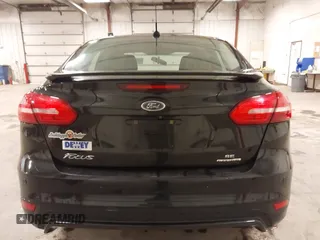 2015 Ford Focus SE with VIN 1FADP3F24FL255450, listed as a IAAI auction lot 41673301 with 103,650 mi miles. Bid and sale history available at carsss.com. Image 16.