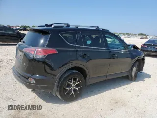 2018 Toyota RAV4 SE with VIN 2T3NFREV6JW436488, listed as a Copart auction lot 60297905 with 74,034 mi miles and Salvage title. Bid and sale history available at DreamBid. Image 3.
