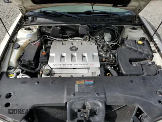 2000 Cadillac Seville Touring STS z VIN 1G6KY5497YU191639, wystawiony jako Copart lot #49658115 z przebiegiem 82 725 mil mil oraz Szkoda całkowita • Salvage title. Historia ofert i sprzedaży dostępna na DreamBid. Obrazek 11.