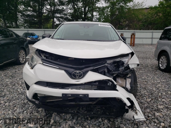 2018 Toyota RAV4 LE with VIN 2T3BFREV3JW764258, listed as a Copart auction lot 61234155 with Not provided miles and Salvage title. Bid and sale history available at DreamBid. Image 5.