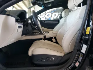 2023 Genesis G80 z VIN KMTGE4S1XPU005594, wystawiony jako Copart lot #59148875 z przebiegiem 20 576 mil mil oraz Nie do naprawy • Non repairable. Historia ofert i sprzedaży dostępna na DreamBid. Obrazek 7.