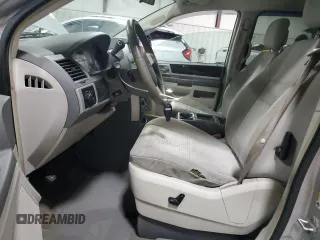 2010 Dodge Grand Caravan SXT with VIN 2D4RN5D1XAR268976, listed as a Copart auction lot 54587505 with 179,000 mi miles and Salvage Title. Bid and sale history available at DreamBid. Image 7.