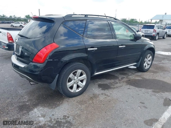 2006 Nissan Murano SL with VIN JN8AZ08T06W411157, listed as a IAAI auction lot 41957424 with 121,902 mi miles. Bid and sale history available at carsss.com. Image 4.