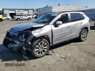 2021 Toyota RAV4 XLE Premium with VIN 2T3A1RFV1MC246969, listed as a Copart auction lot 57166525 with 52,583 mi miles and Salvage title. Bid and sale history available at DreamBid. Image 1.