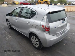 2014 Toyota Prius One with VIN JTDKDTB33E1067408, listed as a IAAI auction lot 41573895 with 245,383 mi miles and . Bid and sale history available at DreamBid. Image 3.