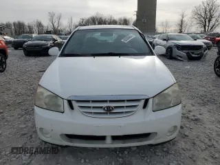 2006 Kia Spectra EX with VIN KNAFE121265208526, listed as a Copart auction lot 80300604 with 101,780 mi miles and Salvage Title. Bid and sale history available at carsss.com. Image 5.