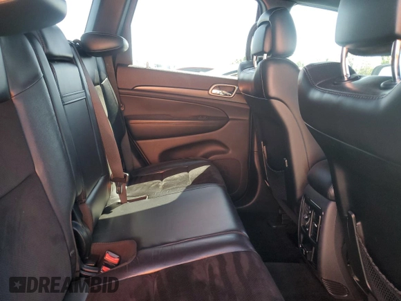 2017 Jeep Grand Cherokee 75th Anniversary with VIN 1C4RJEAG4HC700191, listed as a Copart auction lot 52520655 with 130,828 mi miles and Salvage title. Bid and sale history available at DreamBid. Image 11.