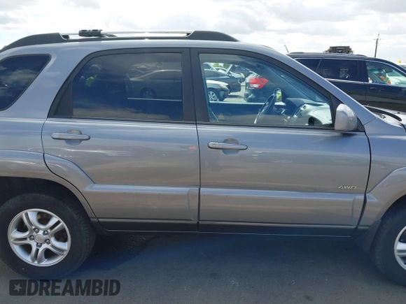 2005 Kia Sportage LX with VIN KNDJE723257122055, listed as a IAAI auction lot 42192102 with 167,726 mi miles and . Bid and sale history available at carsss.com. Image 13.