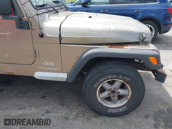 2005 Jeep Wrangler Sport with VIN 1J4FA49SX5P317120, listed as a IAAI auction lot 42677397 with 71,403 mi miles and . Bid and sale history available at DreamBid. Image 18.