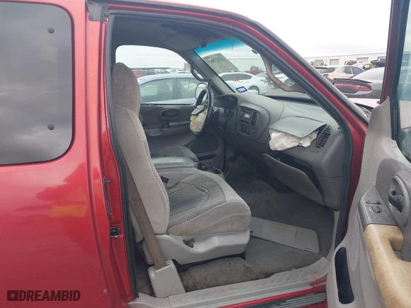 2000 Ford F-150 Work Series with VIN 1FTRX07W2YKA56826, listed as a IAAI auction lot 41527865 with 1 mi miles. Bid and sale history available at carsss.com. Image 5.