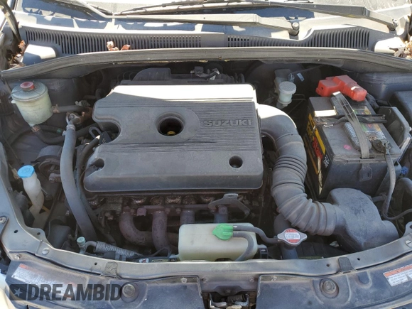 2007 Suzuki SX4 z VIN JS2YB413975110576, wystawiony jako Copart lot #47078645 z przebiegiem 170 280 mil mil oraz Szkoda całkowita • Salvage title. Historia ofert i sprzedaży dostępna na DreamBid. Obrazek 12.