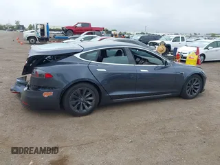 2020 Tesla Model S Long Range with VIN 5YJSA1E29LF363957, listed as a IAAI auction lot 42402667 with 45,058 mi miles and . Bid and sale history available at DreamBid. Image 13.