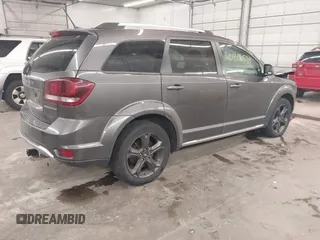 2018 Dodge Journey Crossroad with VIN 3C4PDDGG4JT388786, listed as a IAAI auction lot 40948539 with 122,449 mi miles. Bid and sale history available at carsss.com. Image 4.