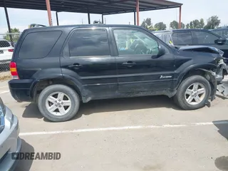 2006 Ford Escape Hybrid z VIN 1FMCU96H96KA25975, wystawiony jako IAAI lot #42130554 z przebiegiem 235 342 mil mil oraz . Historia ofert i sprzedaży dostępna na DreamBid. Obrazek 13.