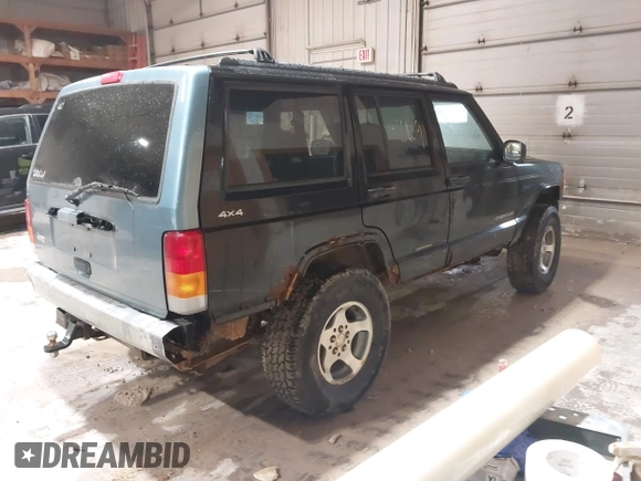 1998 Jeep Cherokee Sport z VIN 1J4FJ68S2WL142027, wystawiony jako IAAI lot #42305669 z przebiegiem 249 580 mil mil oraz . Historia ofert i sprzedaży dostępna na DreamBid. Obrazek 4.