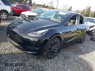 2022 Tesla Model Y Performance with VIN 7SAYGDEF0NF406262, listed as a IAAI auction lot 41132514 with 27,171 mi miles. Bid and sale history available at carsss.com. Image 20.