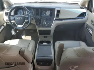 2015 Toyota Sienna XLE with VIN 5TDYK3DC4FS643797, listed as a Copart auction lot 55975385 with 61,882 mi miles and Salvage Title. Bid and sale history available at DreamBid. Image 8.