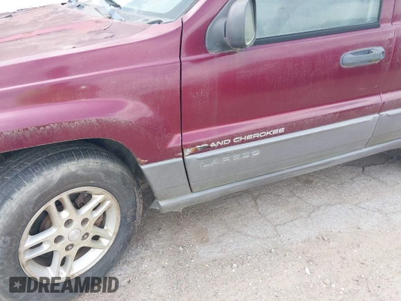 2003 Jeep Grand Cherokee Laredo with VIN 1J4GX48S83C576892, listed as a IAAI auction lot 42082865 with 212,157 mi miles. Bid and sale history available at carsss.com. Image 6.
