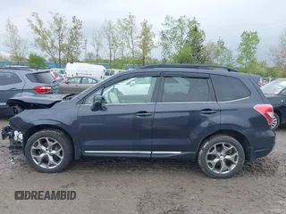 2016 Subaru Forester Touring z VIN JF2SJAXC4GH536118, wystawiony jako IAAI lot #42208701 z przebiegiem 117 227 mil mil oraz . Historia ofert i sprzedaży dostępna na DreamBid. Obrazek 14.