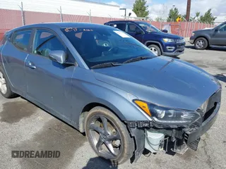 2019 Hyundai Veloster 2.0 with VIN KMHTG6AF8KU019854, listed as a IAAI auction lot 41697113 with 123,851 mi miles. Bid and sale history available at carsss.com. Image 20.