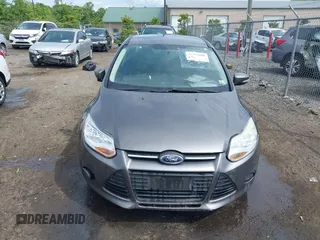 2013 Ford Focus SE z VIN 1FADP3F24DL104718, wystawiony jako IAAI lot #42206680 z przebiegiem Nie podano mil oraz . Historia ofert i sprzedaży dostępna na DreamBid. Obrazek 12.