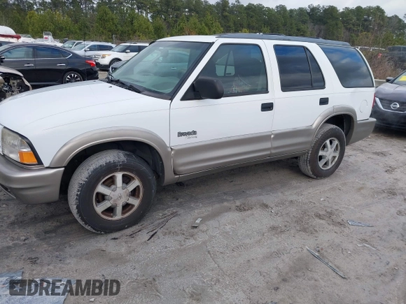 2001 Oldsmobile Bravada z VIN 1GHDT13W512122383, wystawiony jako IAAI lot #41624026 z przebiegiem 176 973 mil mil oraz . Historia ofert i sprzedaży dostępna na DreamBid. Obrazek 2.