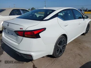2024 Nissan Altima SR with VIN 1N4BL4CV0RN313828, listed as a IAAI auction lot 42172052 with 5,279 mi miles and . Bid and sale history available at DreamBid. Image 4.