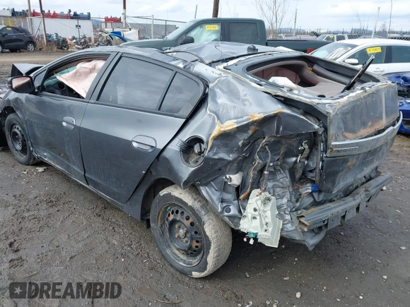 2012 Honda Insight LX with VIN JHMZE2H53CS001624, listed as a IAAI auction lot 42024921 with Not provided miles and . Bid and sale history available at DreamBid. Image 3.