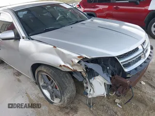 2012 Dodge Avenger SXT with VIN 1C3CDZCB2CN195212, listed as a IAAI auction lot 41374232 with 107,973 mi miles and . Bid and sale history available at DreamBid. Image 12.