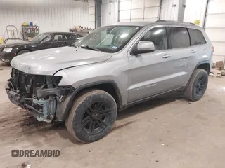 2015 Jeep Grand Cherokee Laredo with VIN 1C4RJFAG4FC797069, listed as a IAAI auction lot 41435299 with 146,755 mi miles. Bid and sale history available at carsss.com. Image 17.