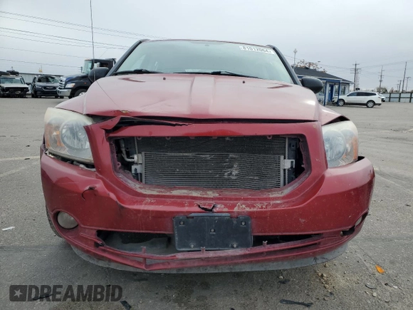 2009 Dodge Caliber SXT with VIN 1B3HB48CX9D108152, listed as a Copart auction lot 81012064 with 189,650 mi miles and Salvage Title. Bid and sale history available at DreamBid. Image 5.