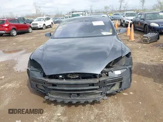 2015 Tesla Model S 85D with VIN 5YJSA1E21FF116775, listed as a IAAI auction lot 41876772 with 128,805 mi miles. Bid and sale history available at carsss.com. Image 13.