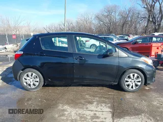 2012 Toyota Yaris L with VIN JTDKTUD31CD500337, listed as a IAAI auction lot 41410723 with 130,881 mi miles. Bid and sale history available at carsss.com. Image 13.