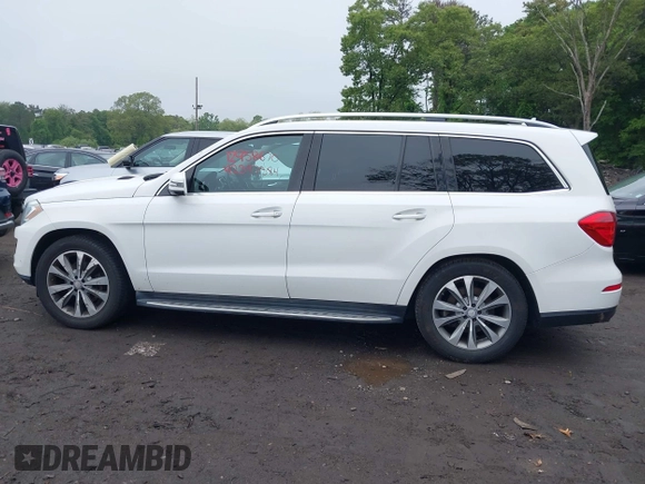 2014 Mercedes-Benz GL 450 with VIN 4JGDF7CE5EA408944, listed as a IAAI auction lot 42397384 with 182,106 mi miles and . Bid and sale history available at DreamBid. Image 14.
