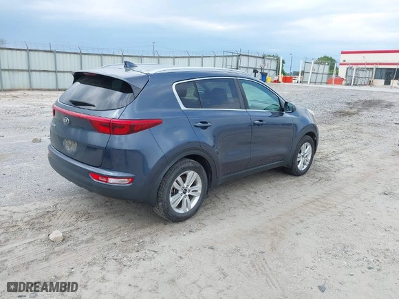2018 Kia Sportage LX with VIN KNDPM3ACXJ7406034, listed as a IAAI auction lot 42007403 with 201,971 mi miles. Bid and sale history available at carsss.com. Image 4.