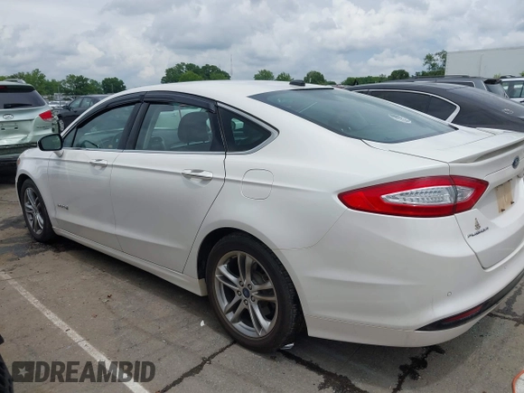 2016 Ford Fusion Titanium Hybrid with VIN 3FA6P0RU3GR190355, listed as a IAAI auction lot 42384309 with 157,172 mi miles and . Bid and sale history available at DreamBid. Image 14.