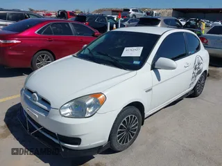 2007 Hyundai Accent GS with VIN KMHCM36C47U050161, listed as a IAAI auction lot 41762927 with 111,684 mi miles. Bid and sale history available at carsss.com. Image 2.