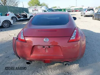 2014 Nissan 370Z Nismo with VIN JN1AZ4EH9EM636340, listed as a IAAI auction lot 42112548 with 143,894 mi miles and . Bid and sale history available at DreamBid. Image 17.