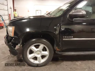 2012 Chevrolet Tahoe LTZ with VIN 1GNSKCE02CR297261, listed as a IAAI auction lot 40255137 with 283,110 mi miles and . Bid and sale history available at DreamBid. Image 19.