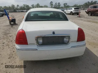 2003 Lincoln Town Car Executive z VIN 1LNHM81W73Y652530, wystawiony jako Copart lot #51606225 z przebiegiem 122 019 mil mil oraz Szkoda całkowita • Salvage title. Historia ofert i sprzedaży dostępna na DreamBid. Obrazek 6.