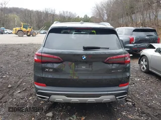 2023 BMW X5 xDrive40i with VIN 5UXCR6C07P9N61205, listed as a IAAI auction lot 42010313 with 34,127 mi miles. Bid and sale history available at carsss.com. Image 17.