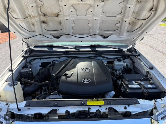 2013 Toyota Tacoma with VIN 5TFLU4EN1DX063442, listed as a Copart auction lot 62521295 with 211,682 mi miles and Clean title. Bid and sale history available at DreamBid. Image 7.
