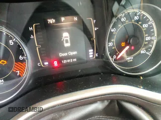 2014 Jeep Cherokee Latitude with VIN 1C4PJLCB1EW231178, listed as a IAAI auction lot 42128894 with 121,412 mi miles. Bid and sale history available at carsss.com. Image 7.