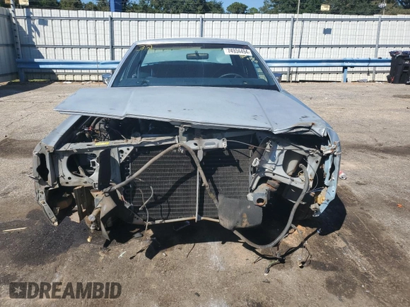 1989 Ford Crown Victoria z VIN 2FABP74F2KX141884, wystawiony jako Copart lot #74934494 z przebiegiem 84 761 mil mil oraz Szkoda całkowita • Salvage title. Historia ofert i sprzedaży dostępna na DreamBid. Obrazek 5.