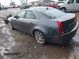 2009 Cadillac CTS AWD z VIN 1G6DT57V790133622, wystawiony jako IAAI lot #42272929 z przebiegiem 124 695 mil mil oraz . Historia ofert i sprzedaży dostępna na DreamBid. Obrazek 3.
