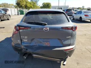 2023 Mazda CX-30 2.5 S Carbon Edition with VIN 3MVDMBCM5PM508471, listed as a Copart auction lot 87279944 with 29,756 mi miles and Non Repairable. Bid and sale history available at carsss.com. Image 6.