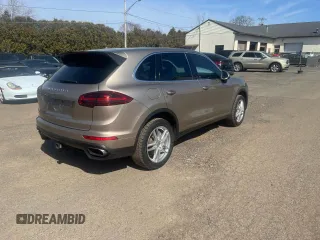 2018 Porsche Cayenne z VIN WP1AA2A26JKA00392, wystawiony jako Copart lot #49211235 z przebiegiem 87 588 mil mil oraz Czysty tytuł • Clean title. Historia ofert i sprzedaży dostępna na DreamBid. Obrazek 3.