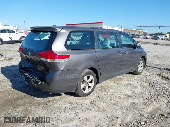 2014 Toyota Sienna L with VIN 5TDZK3DC3ES506658, listed as a IAAI auction lot 41469391 with 169,848 mi miles. Bid and sale history available at carsss.com. Image 4.