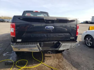 2018 Ford F-150 XL with VIN 1FTMF1EP0JKC60951, listed as a Copart auction lot 77759594 with 152,604 mi miles and Salvage title. Bid and sale history available at DreamBid. Image 6.